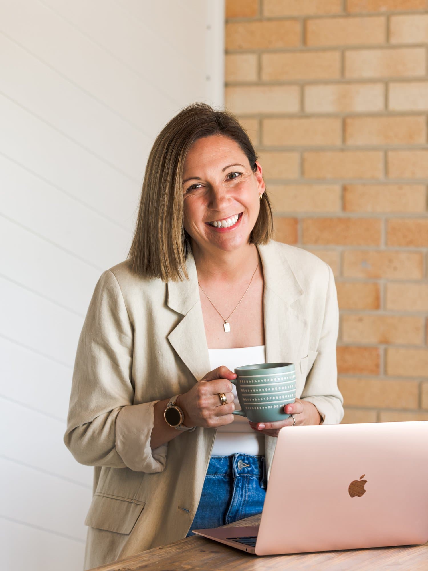 Steph holding a mug